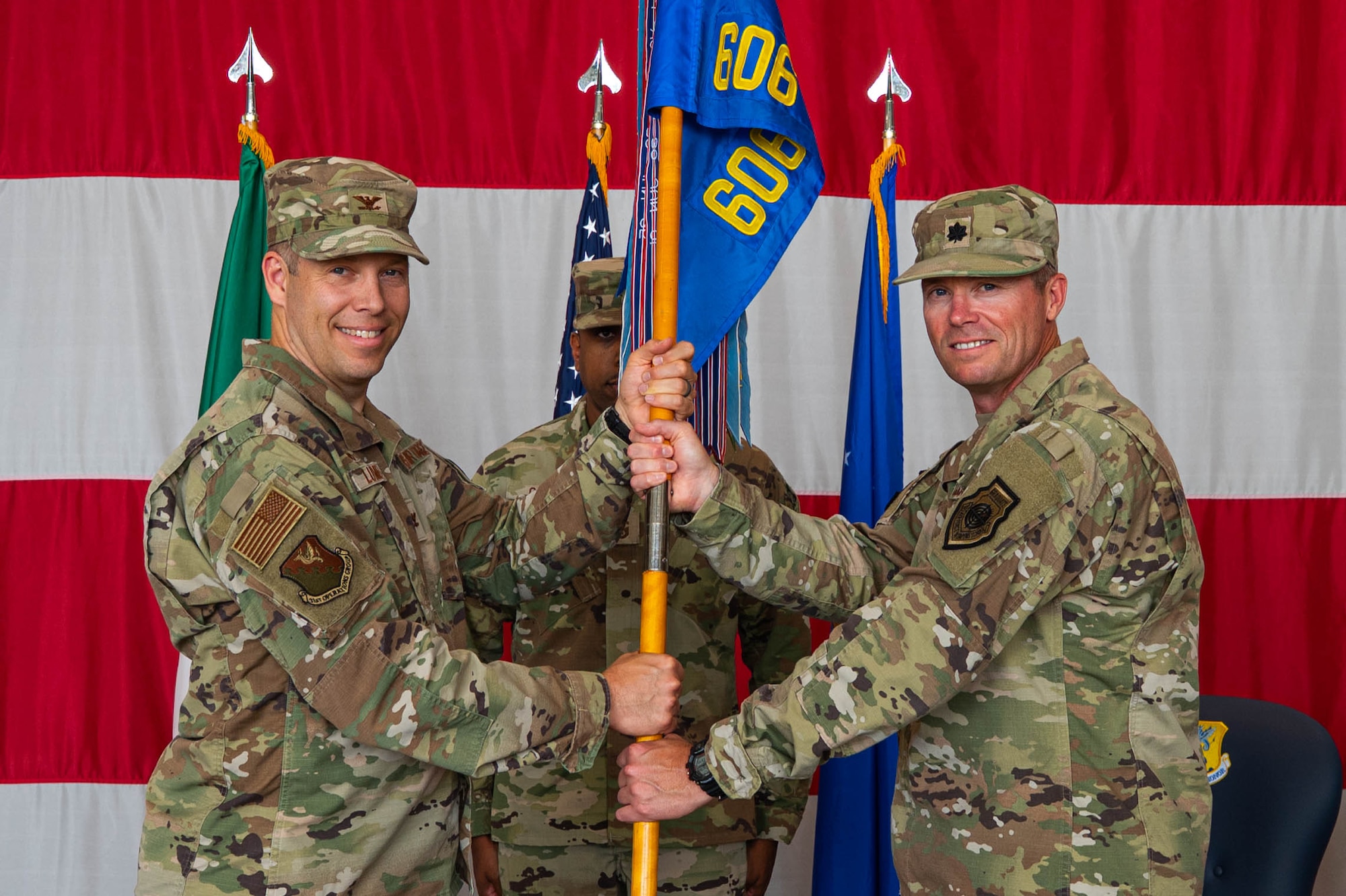 Incoming commander receives guidon during change of command ceremony