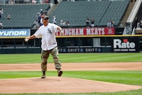 Lt. Gen. Mark Landes, Commanding General, First Army, throws in a ceremonial first pitch during Major League Baseball’s Chicago White Sox’ military recognition at a home game, July 9, 2025.