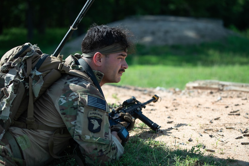 Sgt. Andrew Parrish of 3rd Platoon, Charlie Company, 1st Battalion, 149th Infantry, assumes the prone firing position on a range during a simulated assault as a part of the Exportable Combat Training Center (XCTC) exercise at Fort Pickett, Virginia, June 19, 2025.