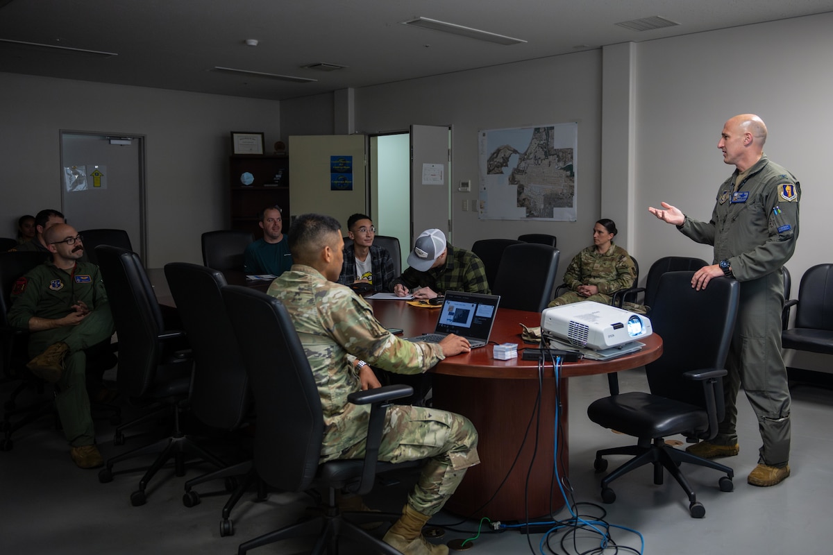 U.S. Air Force Col. Jeromy Guinther, 35th Operations Group commander, briefs incoming exercise Resolute Force Pacific (REFORPAC) 2025 members.