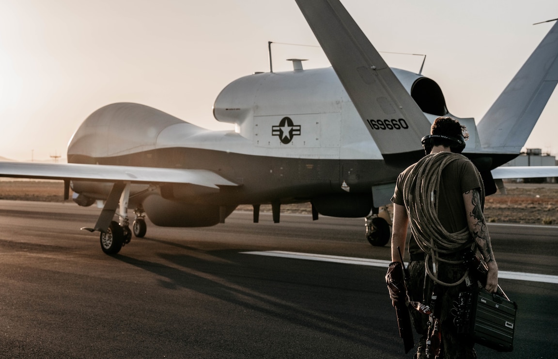 NAVAL AIR STATION SIGONELLA, Italy (Jul. 2, 2024) Aviation Electronics Technician Second Class Matt Belvery, assigned to Unmanned Patrol Squadron (VUP) 19, prepares to begin postflight on an MQ-4C Triton at Naval Air Station (NAS) Sigonella, Italy, Jul. 2, 2024. VUP-19 is deployed to the U.S.  6th Fleet Area of Operations conducting missions in support of Naval Forces Europe and Africa. (US Navy photo by LT Alex Delgado/released)