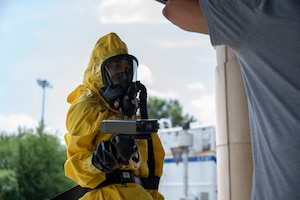 U.S. Air Force Senior Airman Jasia Waddell, 87th Civil Engineer Squadron emergency management apprentice, uses an ADM-300 Multi-Functional Survey Meter during exercise Jersey Dawn 25 at Joint Base McGuire-Dix-Lakehurst, N.J., June 30, 2025.