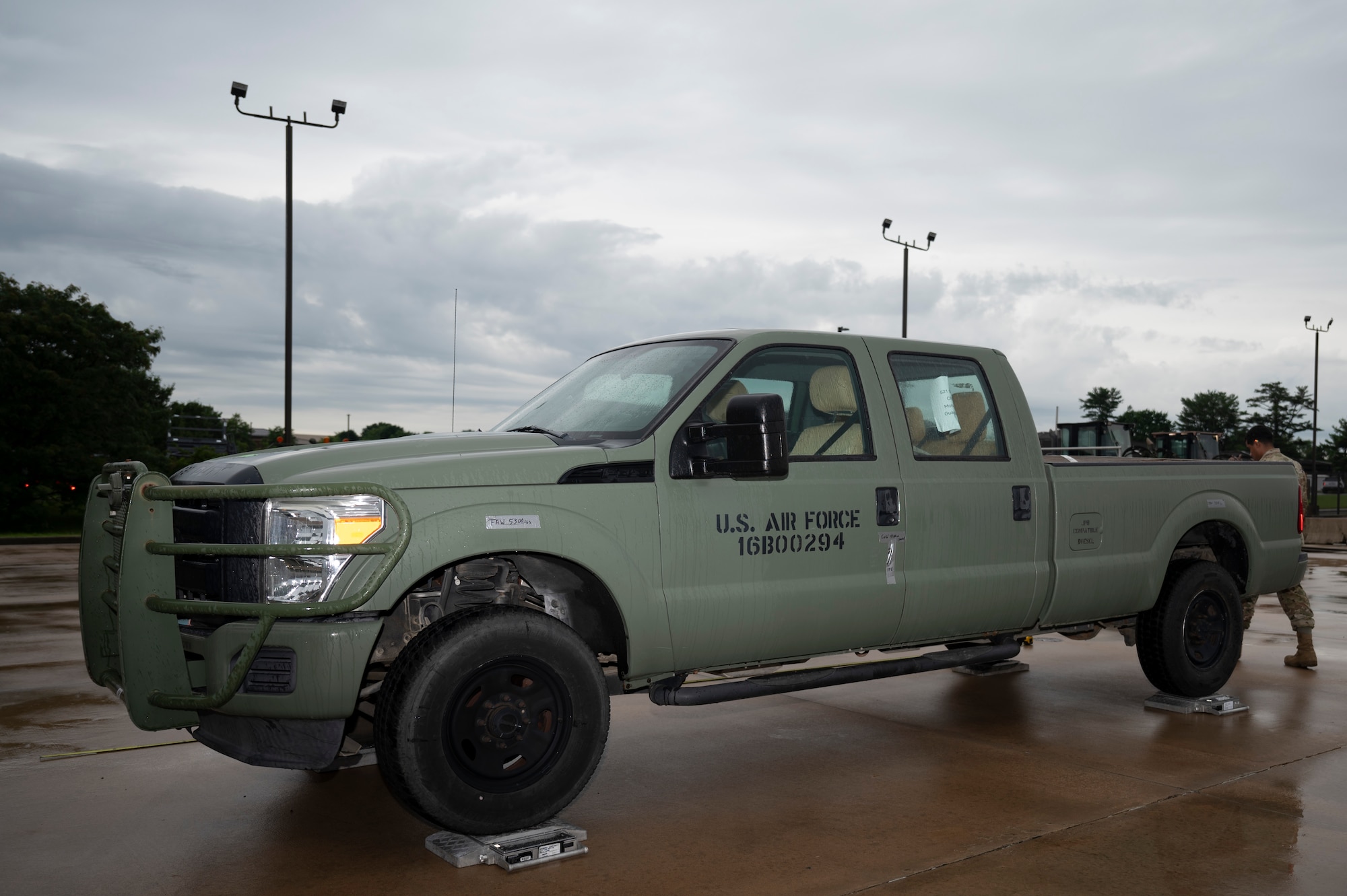 U.S. Air Force 305th Aerial Port Squadron and 521st Contingency Response Squadron personnel measure and weigh a truck for simulated cargo deployment functions during exercise Jersey Dawn 25 at Joint Base McGuire-Dix-Lakehurst, N.J., July 2, 2025.