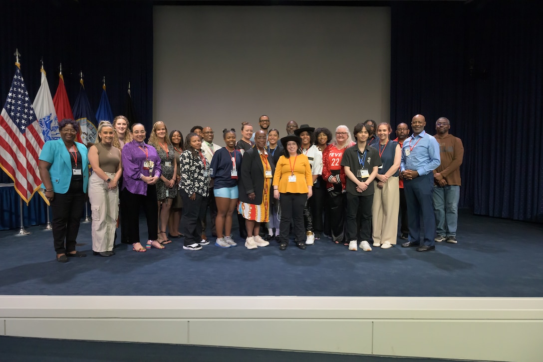 Group pose for picture after an event.