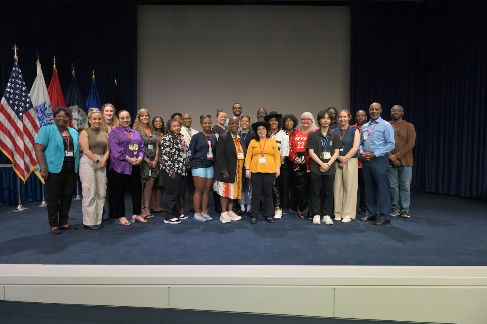 Group pose for picture after an event.