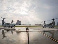 Marines with Marine Aerial Refueler Transport Squadron (VMGR) 152 MV-22B Osprey tiltrotor aircrafts with Marine Medium Tiltrotor Squadron 262 during air delivery ground refueling training aboard Marine Corps Air Station Iwakuni, Japan, Aug. 21, 2015. The KC-130J aircraft is capable of carrying more than 12,000 gallons of fuel and simultaneously refueling two aircraft at 300 gallons a minute. This ability, along with many others, makes VMGR-152 and their aircraft an important asset to Marine Corps’ aviation.