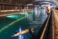 Team OMER get their sub towed back during ISR18 inside the David Taylor Model Basin at NSWC Carderock in Bethesda, Md.