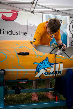 Team OMER from École de Technologie Supérieur (ETS) in Québec, Canada set a new world record for fastest speed in a single-person propellor submarine (7.682 knots) at the International Human-powered Submarines Races hosted biennially at NSWC Carderock Division.  They also took home the Maritime Technology Alliance Overall Performance Award, the Absolute Speed Award, and the Best Spirit of the Races Award.