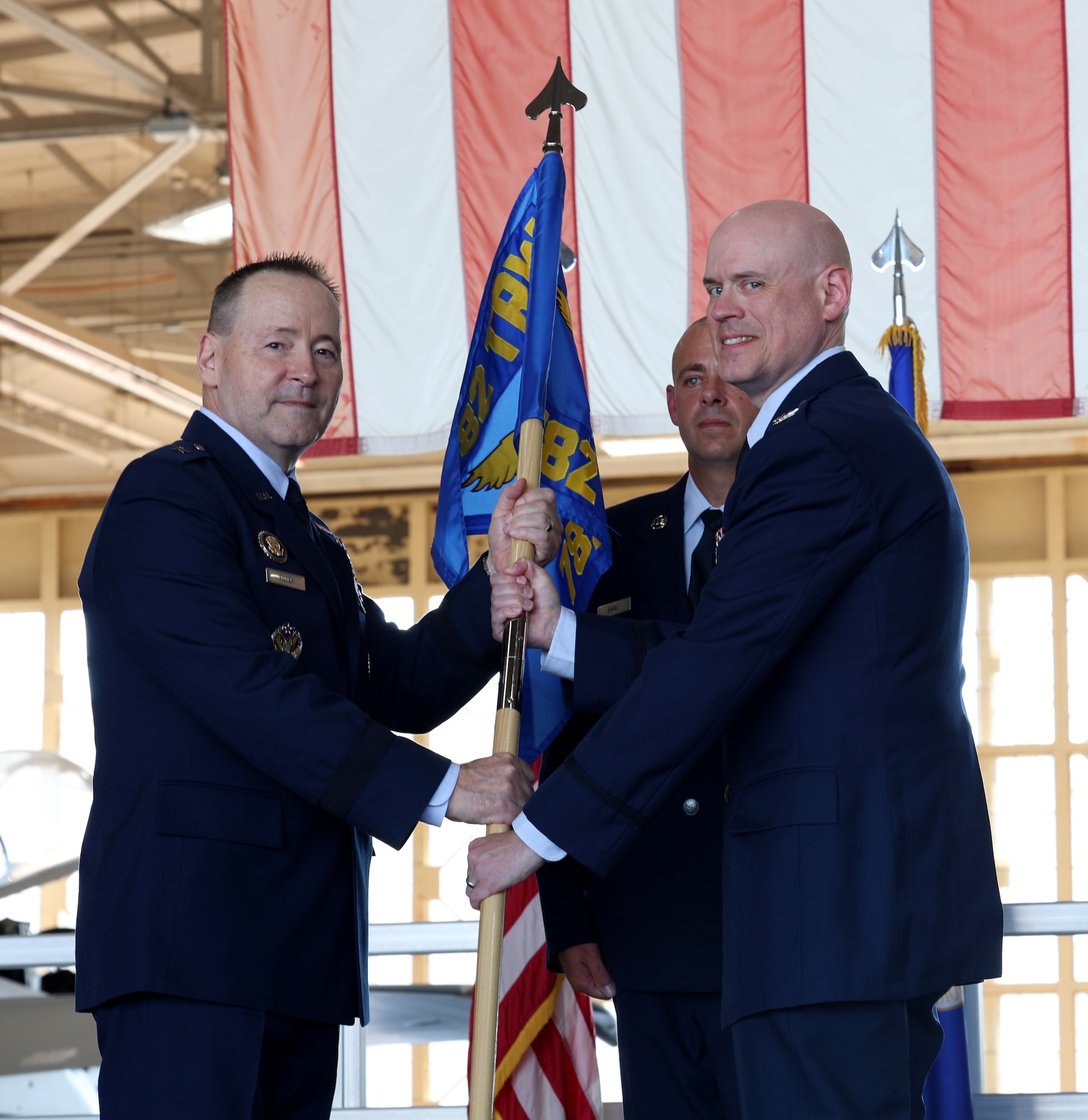Col. Andrew Adams (right) assumes command of the 782nd Training Group