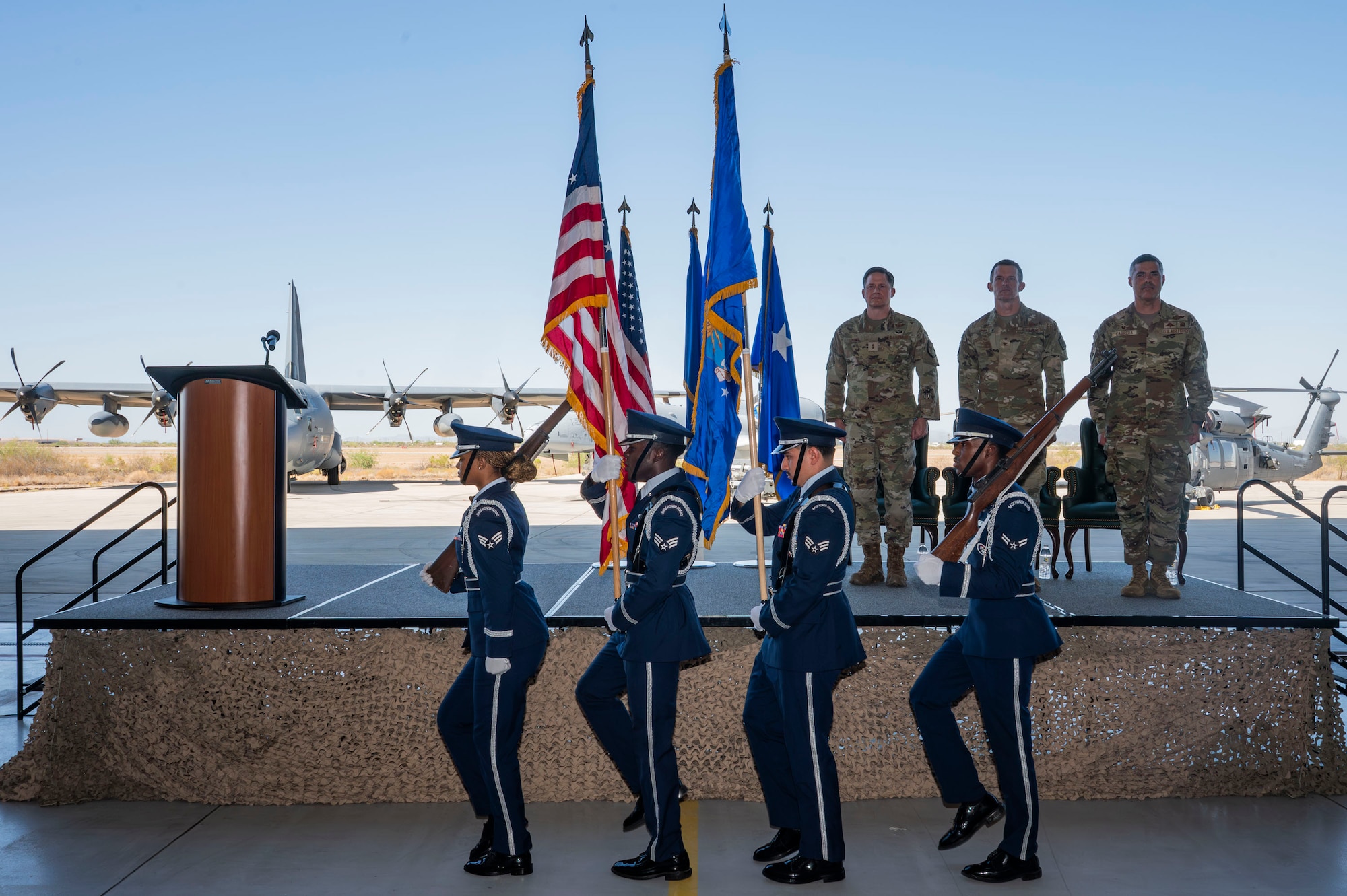 U.S. Air Force Davis-Monthan Honor Guardsmen march during the 355th Wing Change of Command ceremony at Davis-Monthan Air Force Base, Arizona, July 10, 2025. The honor guard presented the colors before the singing of the national anthem and the invocation by the chaplain. (U.S. Air Force photo by Airman Samantha Melecio)