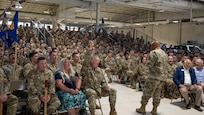 Gen. Anthony Cotton, U.S. Strategic Command commander (USSTRATCOM), Chants the 91st Missile Wing slogan “Bully” with the crowd during the Omaha Trophy ceremony at Minot Air Force Base, North Dakota, July 9, 2025. The Omaha Trophy represents the highest civilian honor awarded to top-performing military units supporting USSTRATCOM’s strategic deterrence efforts.
