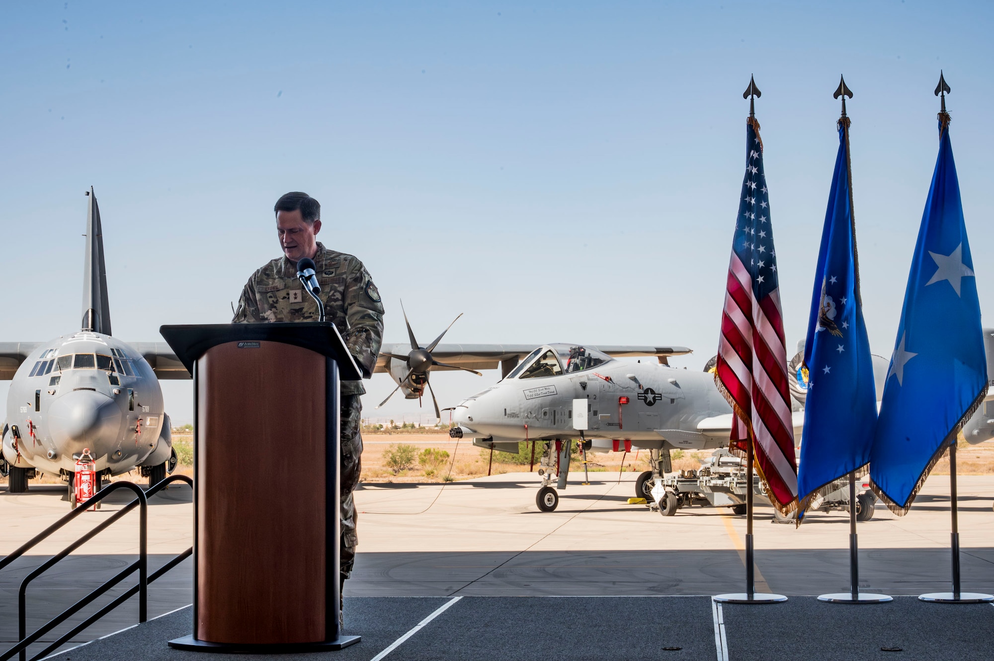 U.S. Air Force Maj. General David Lyons, 15th Air Force commander, gives a speech at the 355th Wing Change of Command ceremony at Davis-Monthan Air Force Base, Arizona, July 10, 2025. Lyons officiated the ceremony and gave thanks to both incoming and outgoing commanders for their service. (U.S. Air Force photo by Airman Samantha Melecio)