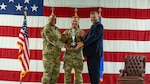 Gen. Anthony Cotton, U.S. Strategic Command commander (left), U.S. Air Force Col. James Schlabach, 91st Missile Wing commander (center), and Mr. Randy Norwood, Omaha Chamber assistant vice president (right), pose for a photo during the Omaha Trophy ceremony at Minot Air Force Base, North Dakota, July 9, 2025. The Omaha Trophy was awarded to the 91MW due to their exemplary readiness, performance and dedication to safeguarding national security.