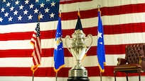 The Omaha Trophy awarded to the 91st Missile Wing, displayed on the Defender Dome stage at Minot Air Force Base, North Dakota, July 9, 2025. This prestigious recognition is given for excellence in areas such as intercontinental ballistic missiles, ballistic missile submarines, strategic bombers, and global operations