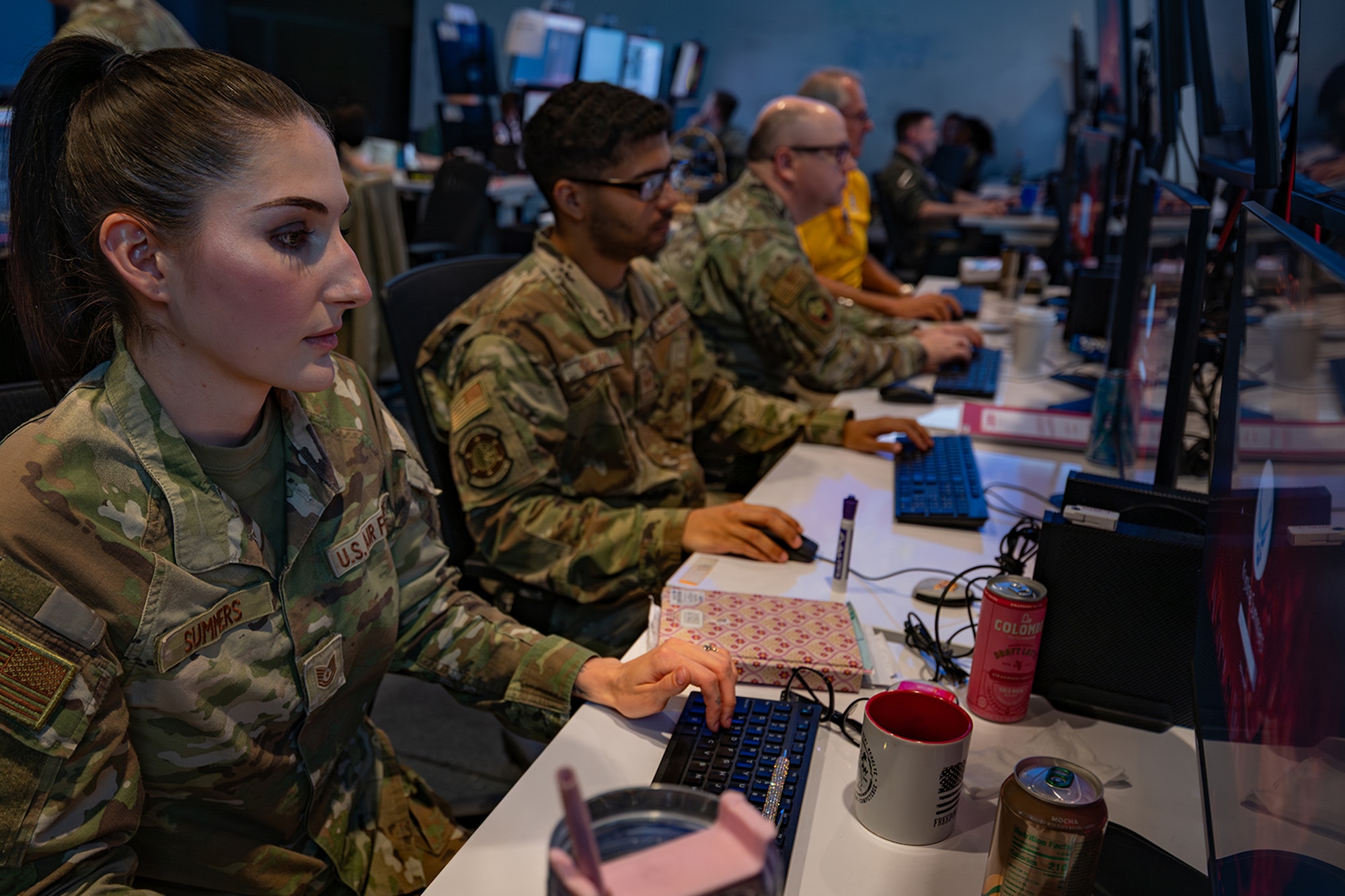 US Airmen working on computers