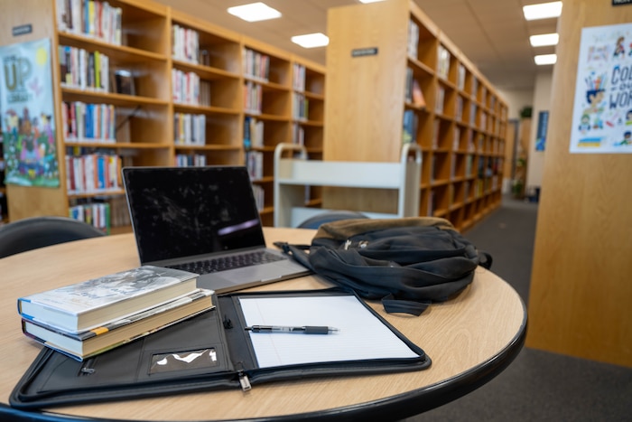 Education supplies are displayed on a table.