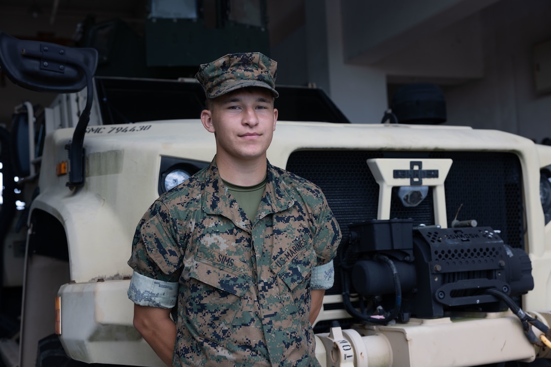 U.S. Marine Corps Pvt. Brady Sims, a motor vehicle operator with 5th Air Naval Gunfire Liaison Company, III Marine Expeditionary Force Information Group, poses for a photo at Camp Hansen, Japan, June 30, 2025. Sims was recently credited with rendering aid to a local Okinawan woman after she sustained minor injuries during a slip and fall.  Sims is a native of Texas. (U.S. Marine Corps photo by Cpl. Bridgette Rodriguez)