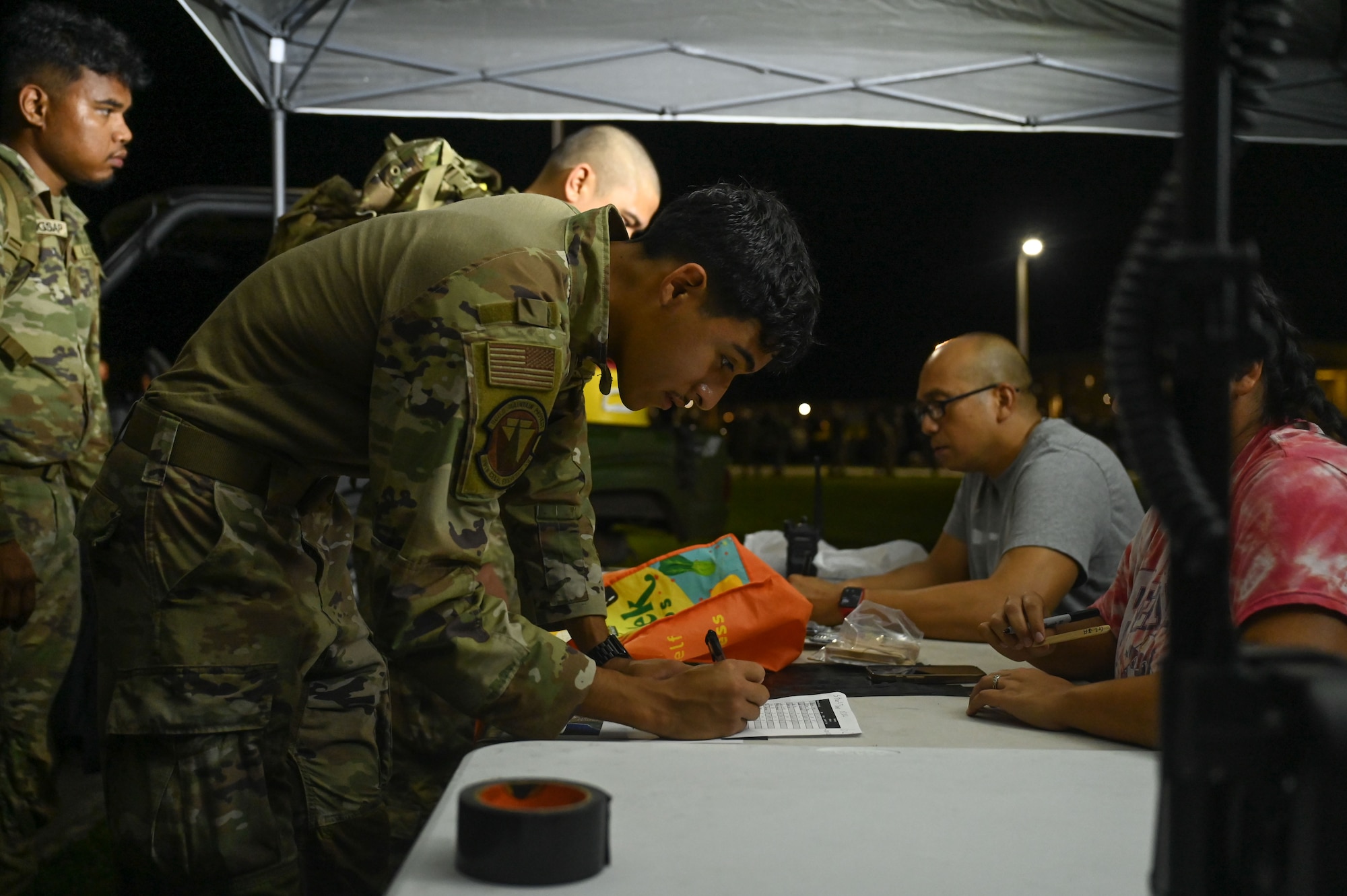 Photo of an Airman signing a waiver
