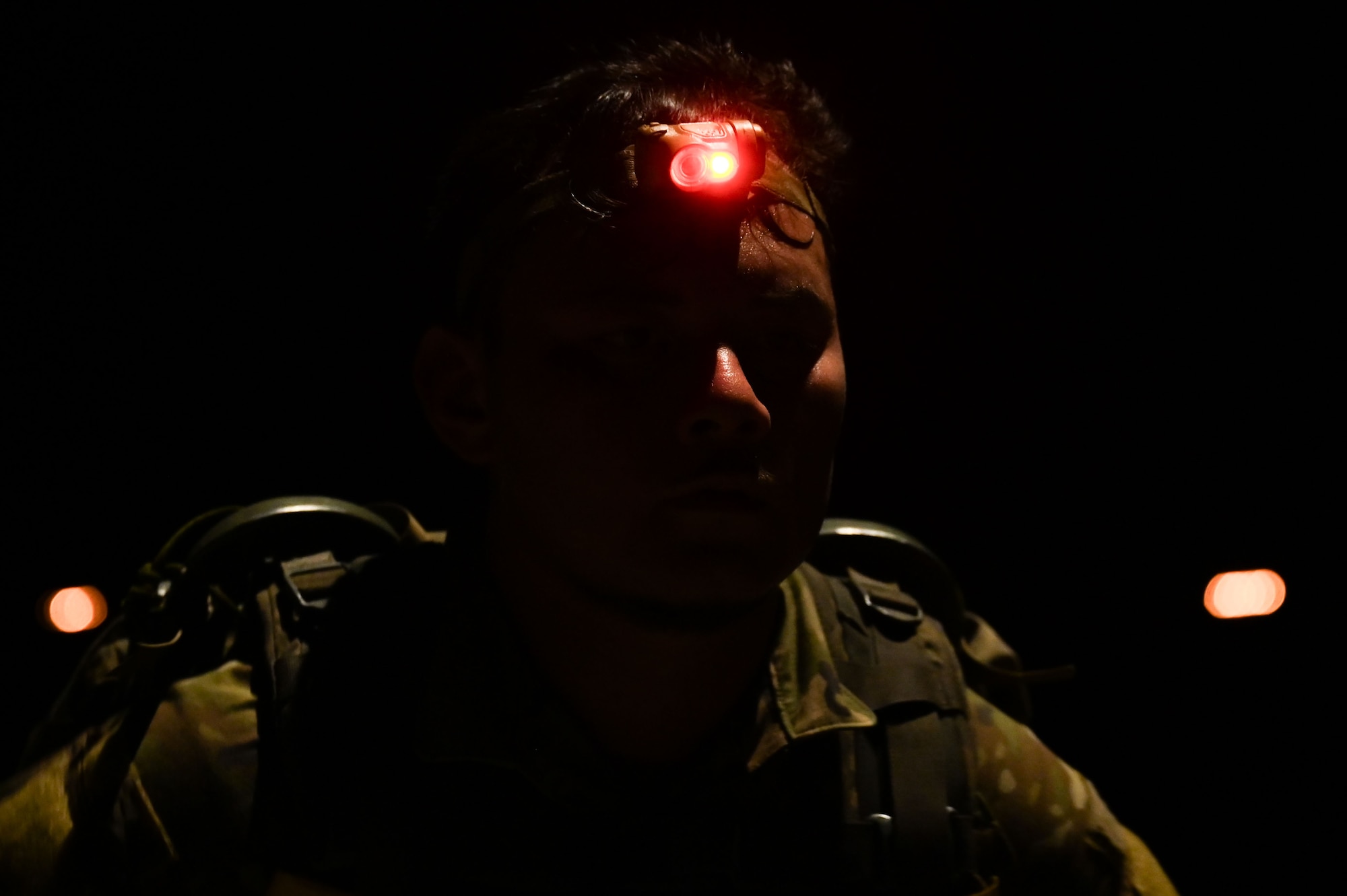 Photo of a participant wearing a headlamp during the Andersen EOD 2025 Norwegian Foot March