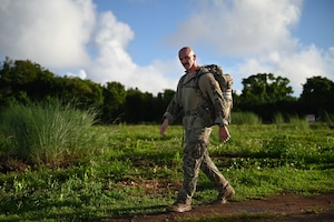 Photo of an Airman completing the Andersen EOD 2025 Norwegian Foot March