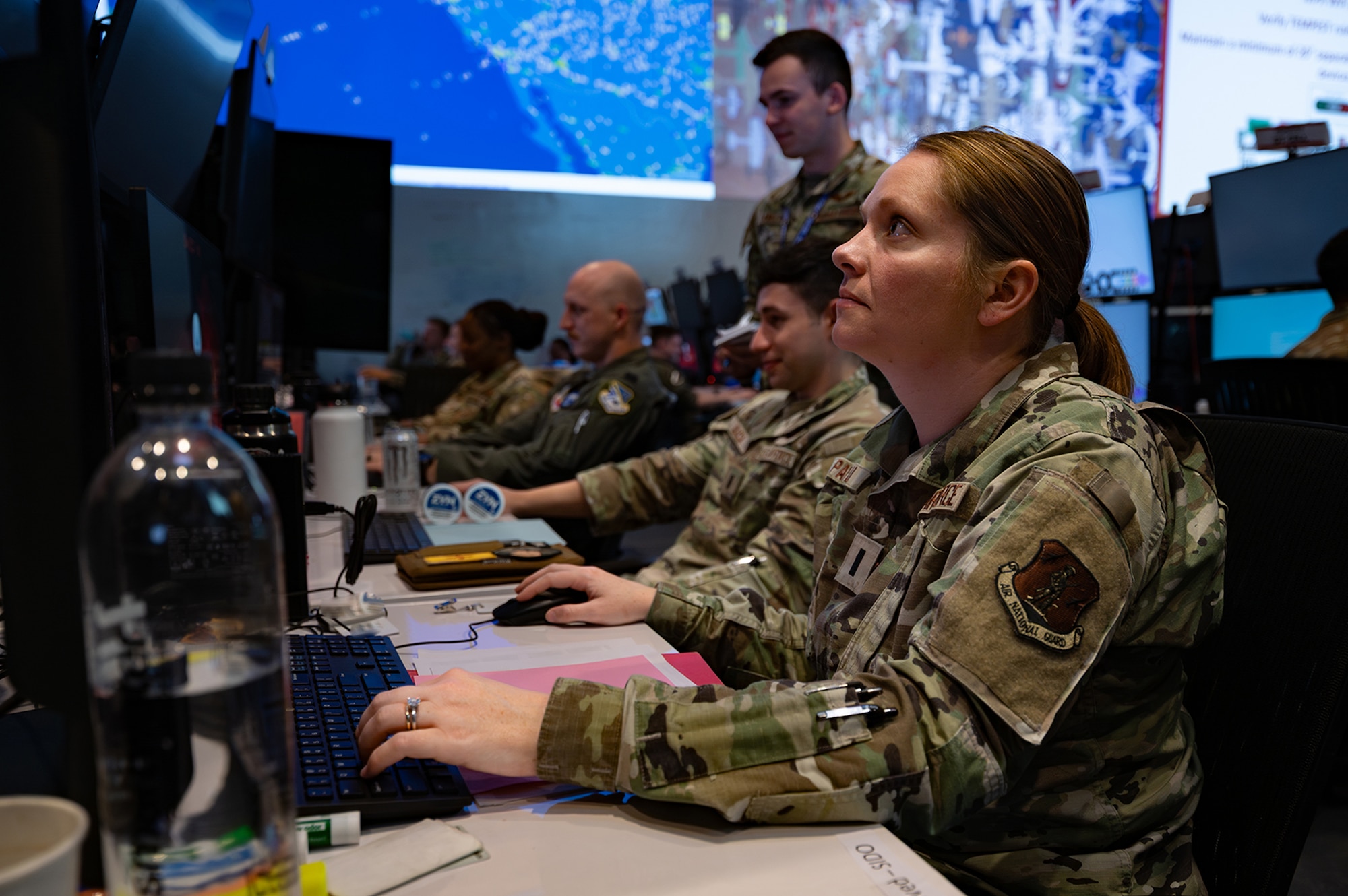 US Airmen working on computers