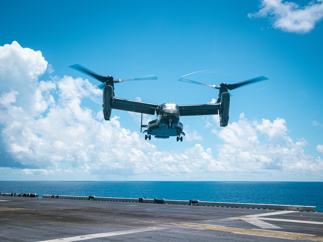 A U.S. Marine Corps MV-22 Osprey with Marine Helicopter Squadron 1 prepares to land during landing drills aboard the Wasp-class amphibious assault ship USS Iwo Jima (LHD 7), during 22nd Marine Expeditionary Unit (Special Operations Capable) Composite Training Unit Exercise while underway in the Atlantic Ocean, June 28, 2025. During COMPTUEX, the IWO ARG and 22nd MEU(SOC), refine tactics, techniques, and procedures to execute warfighting functions that enhance operational readiness and lethality as a unified IWOARG/22 MEU(SOC) team. (U.S. Marine Corps photo by Sgt. Tanner Bernat)
