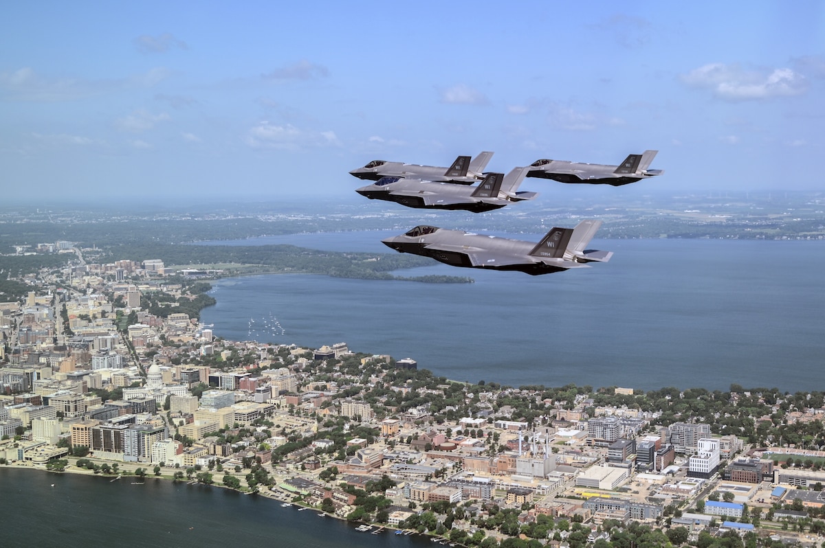 F-35 Lightning IIs fly in formation over Madison, Wis., during a joint training mission with the 148th Fighter Wing based in Duluth, Minn., June 23, 2025. The exercise aimed to strengthen coordination and operational effectiveness between units. (U.S. Air National Guard photo by Senior Airman Addie Peterson)