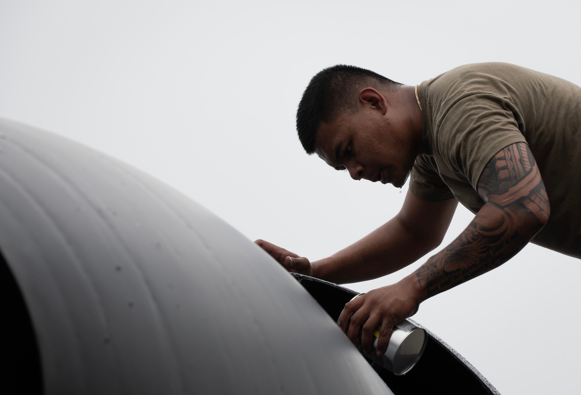 U.S. Air Force Staff Sgt. Peter James Olandez, 23rd Expeditionary Bomber Generation Squadron dedicated crew chief, performs post-flight maintenance on a B-52H Stratofortress after a Bomber Task Force mission at Andersen Air Force Base, Guam, July 7, 2025. The BTF missions enhance operational readiness and provide the training necessary to respond to any potential crisis or challenge in the Indo-Pacific. (U.S. Air Force photo by Senior Airman Alyssa Bankston)