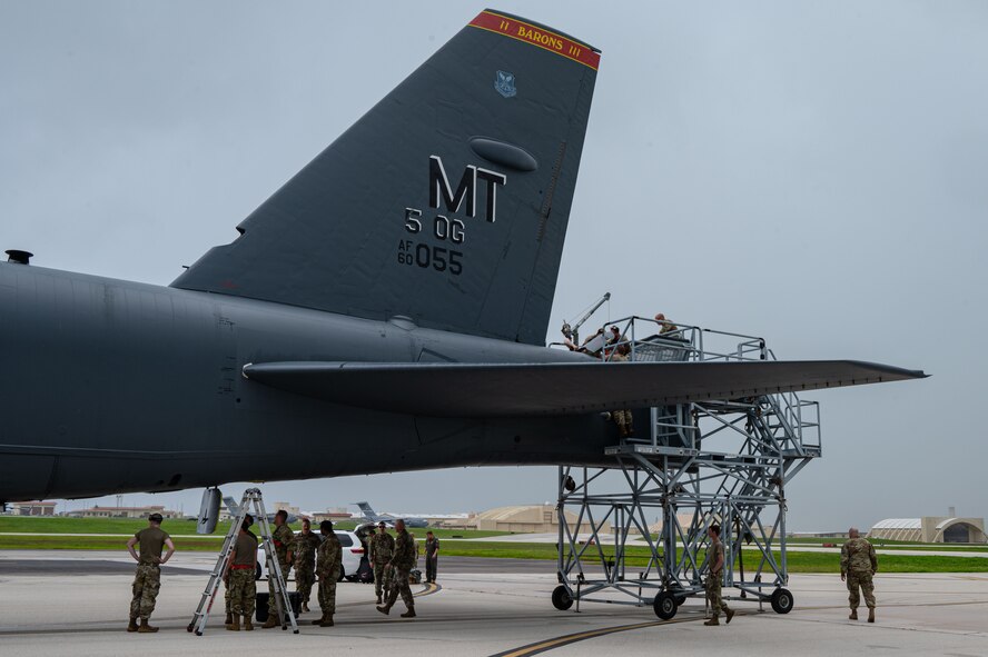 A U.S. Air Force B-52H Stratofortress assigned to the 23rd Expeditionary Bomb Squadron, Minot Air Force Base, North Dakota, receives post-flight maintenance after a Bomber Task Force mission at Andersen Air Force Base, Guam, July 7, 2025. The U.S. demonstrates commitment to allies and partners, including those in the Indo-Pacific, through the global employment of military forces, such as regular BTF deployments. (U.S. Air Force photo by Airman 1st Class Vincent Padilla)