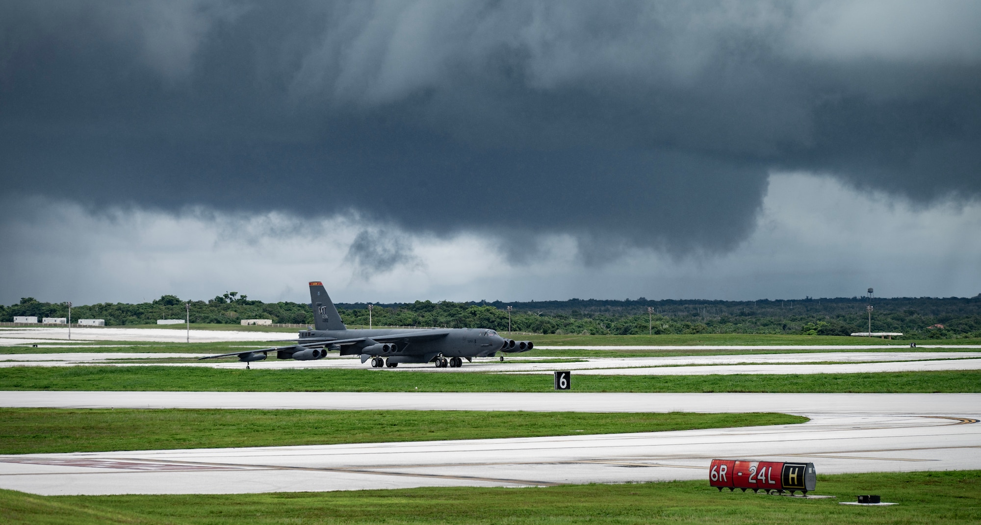 A U.S. Air Force B-52H Stratofortress, assigned to the 23rd Expeditionary Bomb Squadron, Minot Air Force Base, North Dakota, lands on the flight line in support of a Bomber Task Force mission at Andersen Air Force Base, Guam, July 7, 2025. The BTF missions employ U.S. strategic bombers globally, providing a strategic advantage to achieve national and combatant commander objectives. (U.S. Air Force photo by Senior Airman Alyssa Bankston)