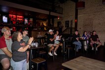 U.S. Marines and civilians applaud the Quantico Marine Rock Band at Rookies RocHaus in West Dundee, Illinois, as part of Marine Week Chicago, July 10, 2025. Throughout the year, Marines across the globe will celebrate the 250th birthday of the Corps, commemorating service, sacrifice, and priding themselves on living ‘Semper Fidelis’ or ‘Always Faithful’ to their nation and to each other. (U.S. Marine Corps photo by Lance Cpl. Elijua Guel)