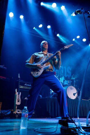 Gunnery Sgt. Eduardo Espinosa, the guitar instrumentalist and unit leader of the Quantico Marine Rock Band, assigned to Special Purpose Marine Air-Ground Task Force-250, performs at Rookies RocHaus in West Dundee, Illinois, as part of Marine Week Chicago 2025, July 10, 2025. The Quantico Marine Rock Band performed as a feature event that promoted the 250th anniversary of the U.S. Marine Corps. Throughout 2025, Marines across the globe will celebrate the 250th birthday of the Corps, commemorating service, sacrifice, and priding themselves on living ‘Semper Fidelis’ or ‘Always Faithful’ to their nation and to each other. (U.S. Marine Corps photo by Lance Cpl. Elijua Guel)