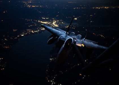 F-15 flying at night