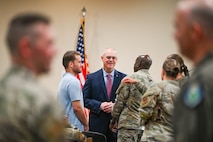 Retired Chief Master Sgt. of the Air Force James A. Roy speaks with U.S. Air Force Col. Adeleke Ekundayo, 628th Mission Support Group commander, during the Professional Development Center grand opening at Joint Base Charleston.