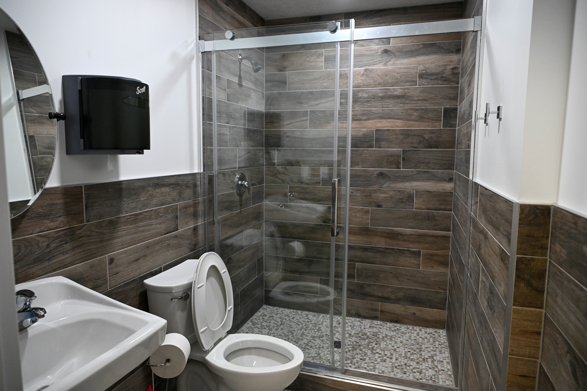 Restroom with walk-in shower and toilet/sink