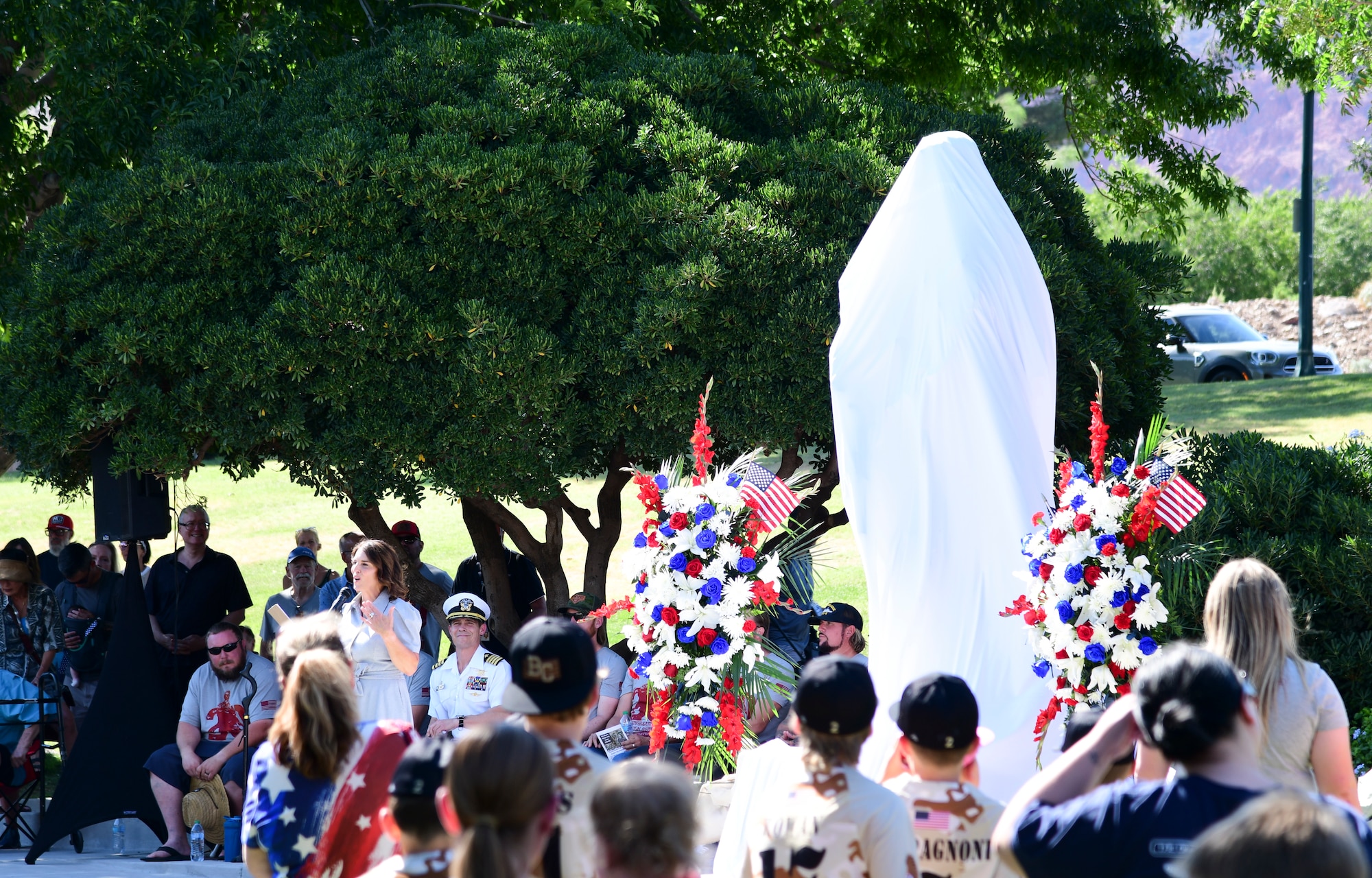 Family, friends and community leaders attend the unveiling ceremony of a statue honoring Navy SEAL Shane E. Patton, Boulder City, Nevada, June 28, 2025.