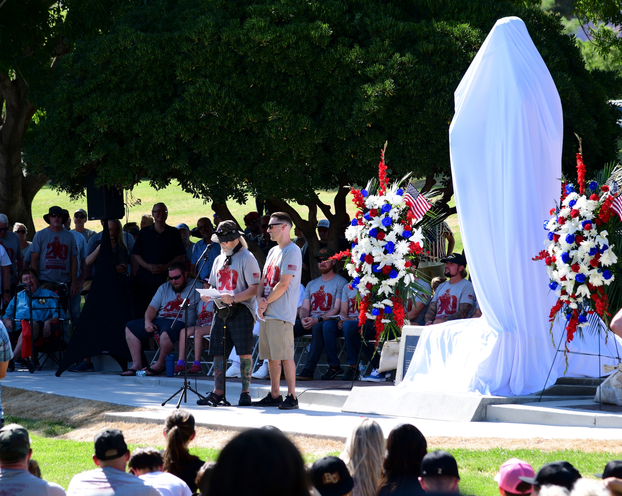 Family, friends and community leaders attend the unveiling ceremony of a statue honoring Navy SEAL Shane E. Patton, Boulder City, Nevada, June 28, 2025.