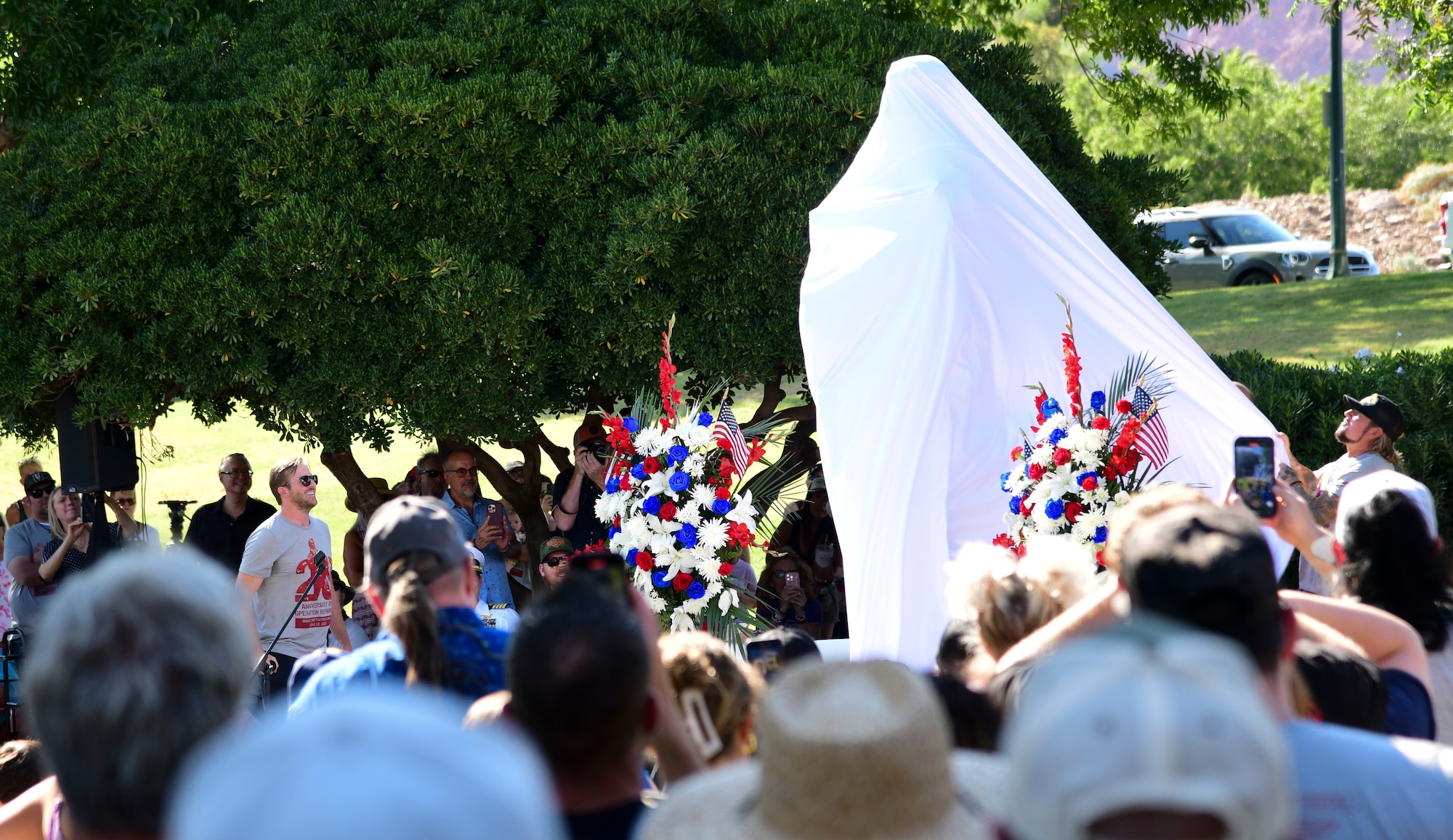 Family, friends and community leaders attend the unveiling ceremony of a statue honoring Navy SEAL Shane E. Patton, Boulder City, Nevada, June 28, 2025.