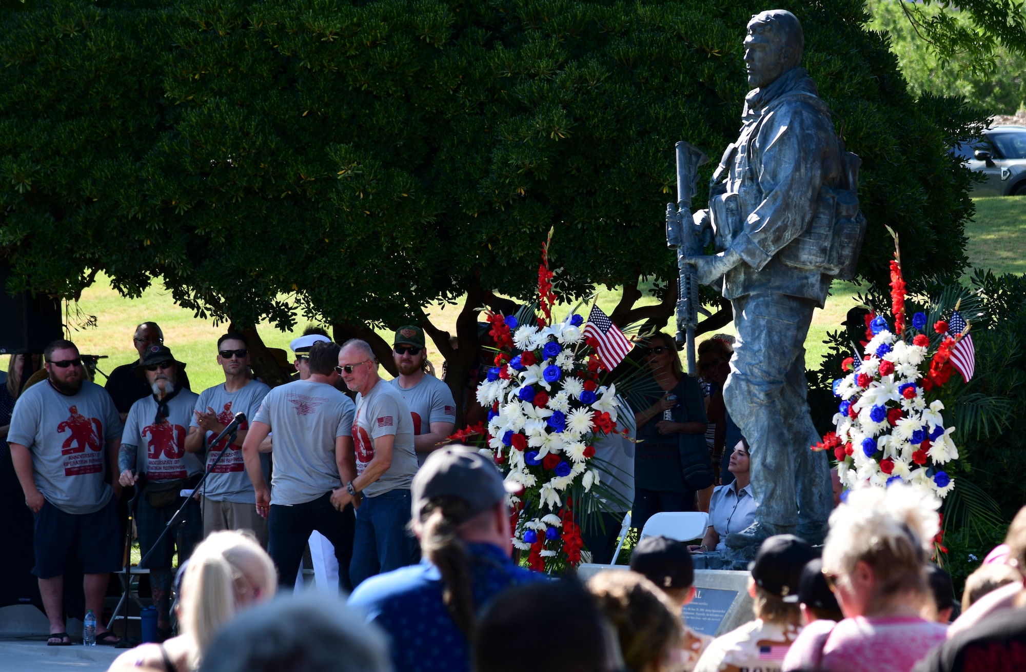 Family, friends and community leaders attend the unveiling ceremony of a statue honoring Navy SEAL Shane E. Patton, Boulder City, Nevada, June 28, 2025.