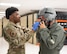 North Dakota Gov. Kelly Armstrong (right) receives assistance with his fitting his oxygen mask from Airman 1st Class Jahleel Wages, 69th Bomb Squadron aircrew flight equipment technician, at Minot Air Force Base, North Dakota, June 30, 2025. The governor was greeted by base leadership, received flight safety training and flew with 69BS aircrew on B-52H Stratofortress over Bismarck, North Dakota. (U.S. Air Force photo by Senior Airman Kendra A. Ransum)
