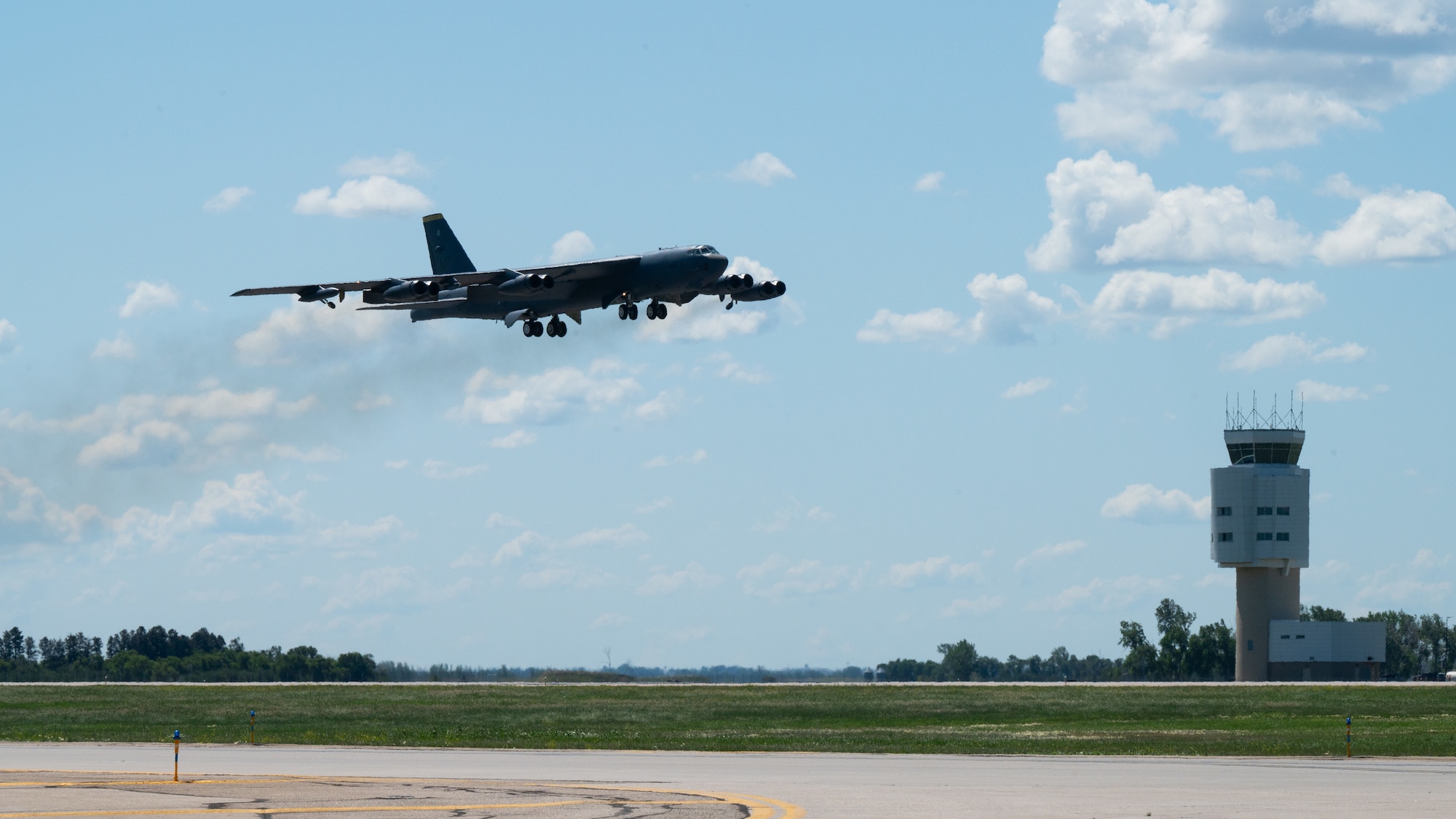 A B-52H Stratofortress carrying North Dakota Gov. Kelly Armstrong takes off from Minot Air Force Base, North Dakota, during an orientation flight, June 30, 2025. The flight departed the base, flew over Bismarck, North Dakota, then returned to Minot AFB. (U.S. Air Force photo by Senior Airman Kendra A. Ransum)