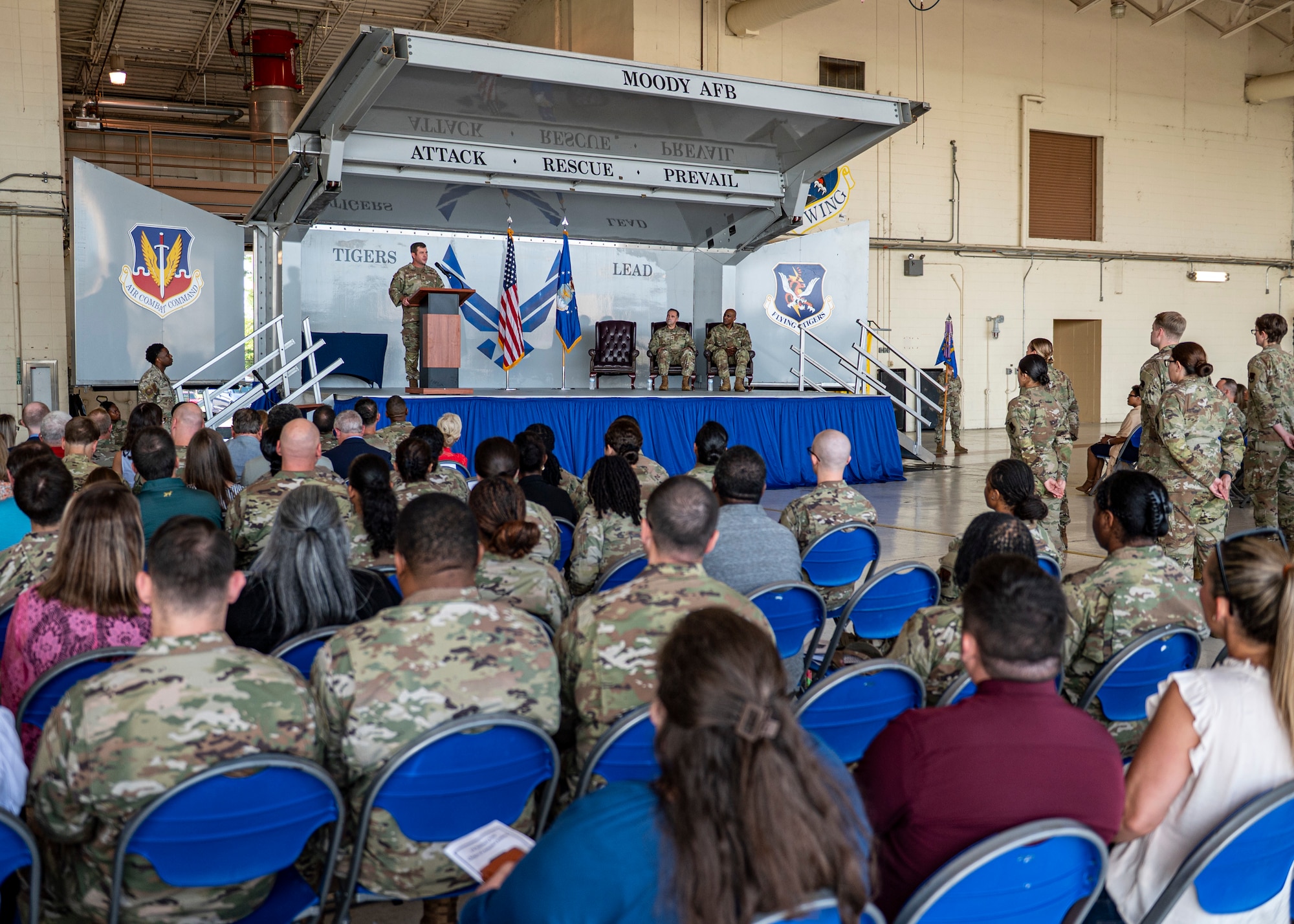U.S. Air Force Col. Paul Sheets, 23rd Wing commander, gives a speech during a change of command ceremony at Moody Air Force Base, Georgia, July 11, 2025. His remarks highlighted the dedication of 23rd MDG personnel and the importance of continuity in leadership. (U.S. Air Force photo by Senior Airman Leonid Soubbotine)