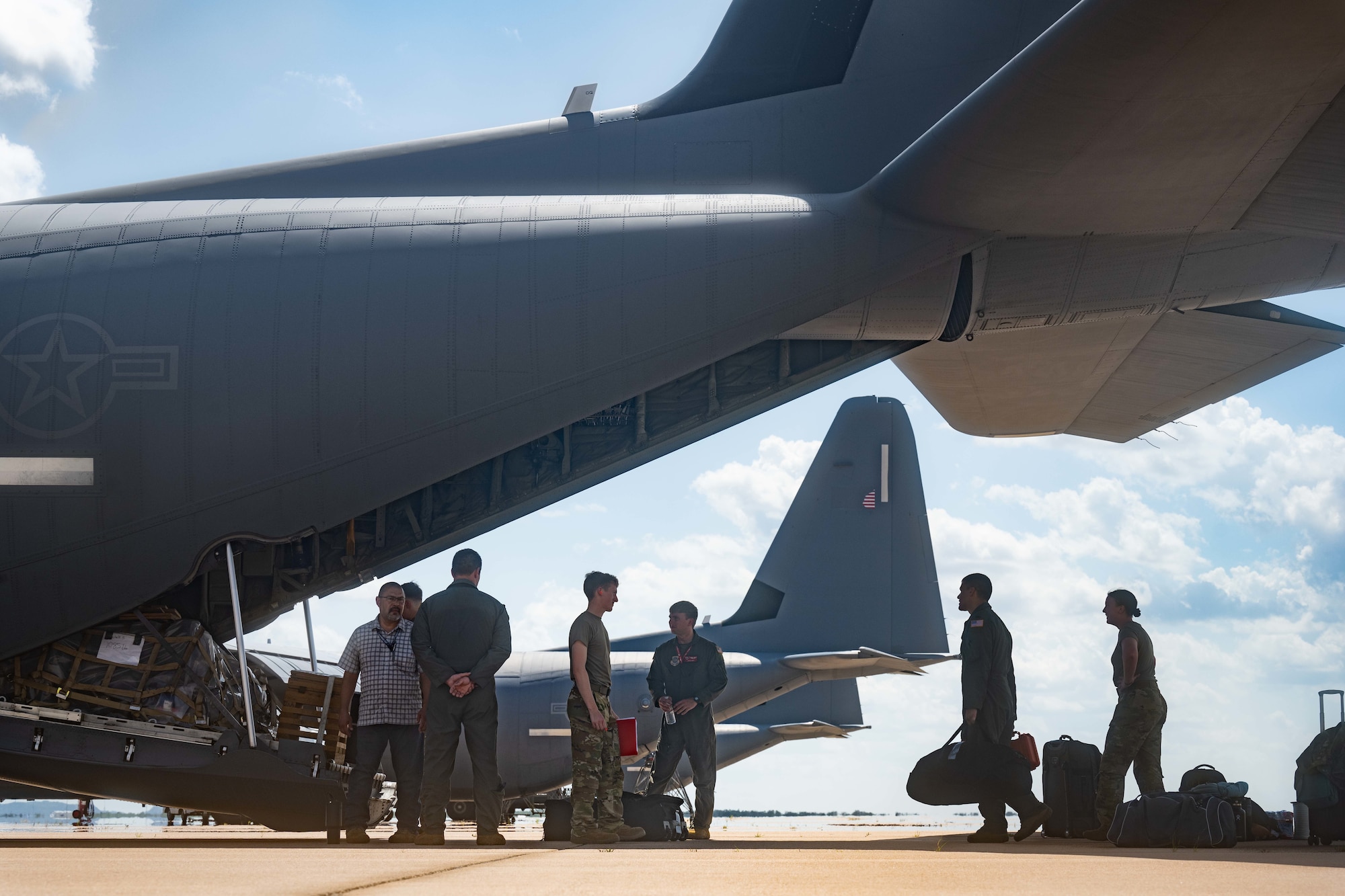 Members from Dyess Air Force Base load cargo onto a C-130J Super Hercules, assigned to the 39th Airlift Squadron, before a Max Endurance Operation in support of the 2025 Department-Level Exercise series at Dyess AFB, Texas, July 8, 2025. This MEO showcased the aircraft’s capabilities in regions with geographic challenges due to the distances between airfields; expanding upon these extended range capabilities allows the wing to improve interoperability among U.S. forces, allies, and partners in the Indo-Pacific region. The DLE series encompasses all branches of the Department of Defense, along with Allies and partners, employing more than 400 Joint and coalition aircraft and more than 12,000 members at more than 50 locations across 3,000 miles. (U.S. Air Force photo by Airman Caleb Schellenberg)