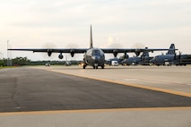 An AC-130J aircrew assigned to the  919h Special Operations Wing taxis an AC-130J Ghostrider gunship at Hurlburt Field, Florida, July 9, 2025. The wing’s mission is evolving and now includes an operational AC-130J squadron based at Hurlburt Field marked by a ceremony held July 11, 2025. The AC-130J provides ground forces an expeditionary, direct-fire platform that is persistent, ideally suited for urban operations and delivers precision low-yield munitions against ground targets. (U.S. Air Force photo by Lt. Col. James Wilson)