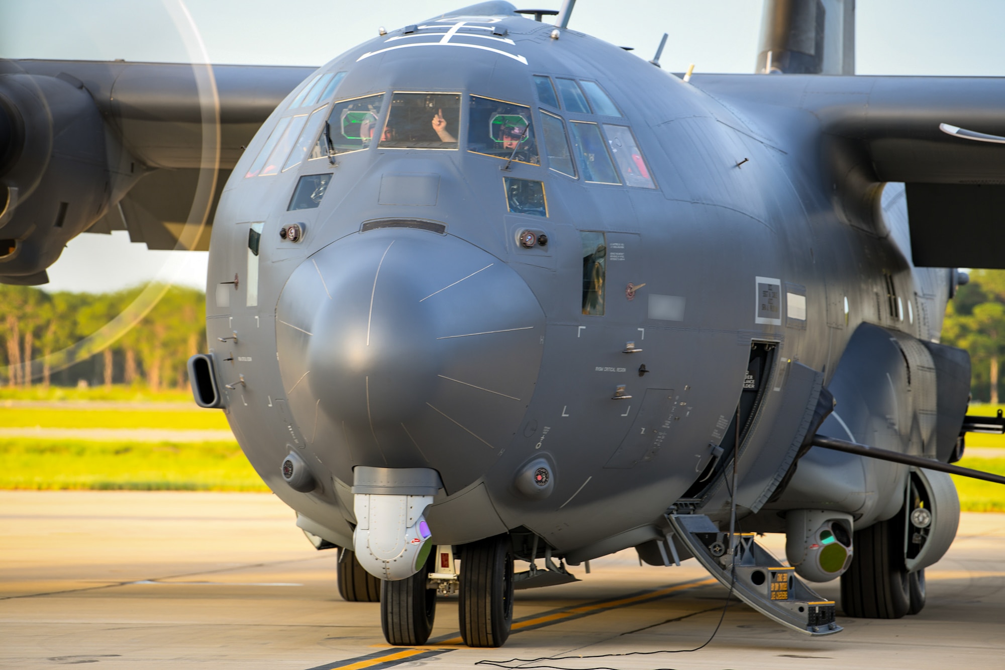 Aircrew from the 919th Special Operations Wing conduct pre-flight checks of an AC-130J Ghostrider gunship before takeoff at Hurlburt Field, Florida, July 9, 2025. The wing’s mission is evolving and now includes an operational AC-130J squadron based at Hurlburt Field, marked by a ceremony held July 11, 2025. The Reserve flew the AC-130 gunship for two decades and nearly 30 years later, it resumes its role as mission partners with active duty aircrew and maintainers. (U.S. Air Force photo by Lt. Col. James Wilson.)