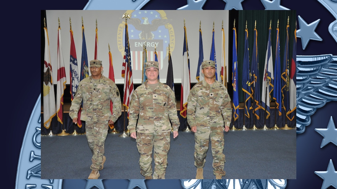 People conclude change of command ceremony.