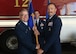 Lt. Col. John LeGloahec, right, accepts command of the 341st Civil Engineer Squadron from Col. Ciro de la Vega III, 341st Mission Support Group commander, left, during a change of command ceremony at Malmstrom Air Force Base, Mont., July 11, 2025.