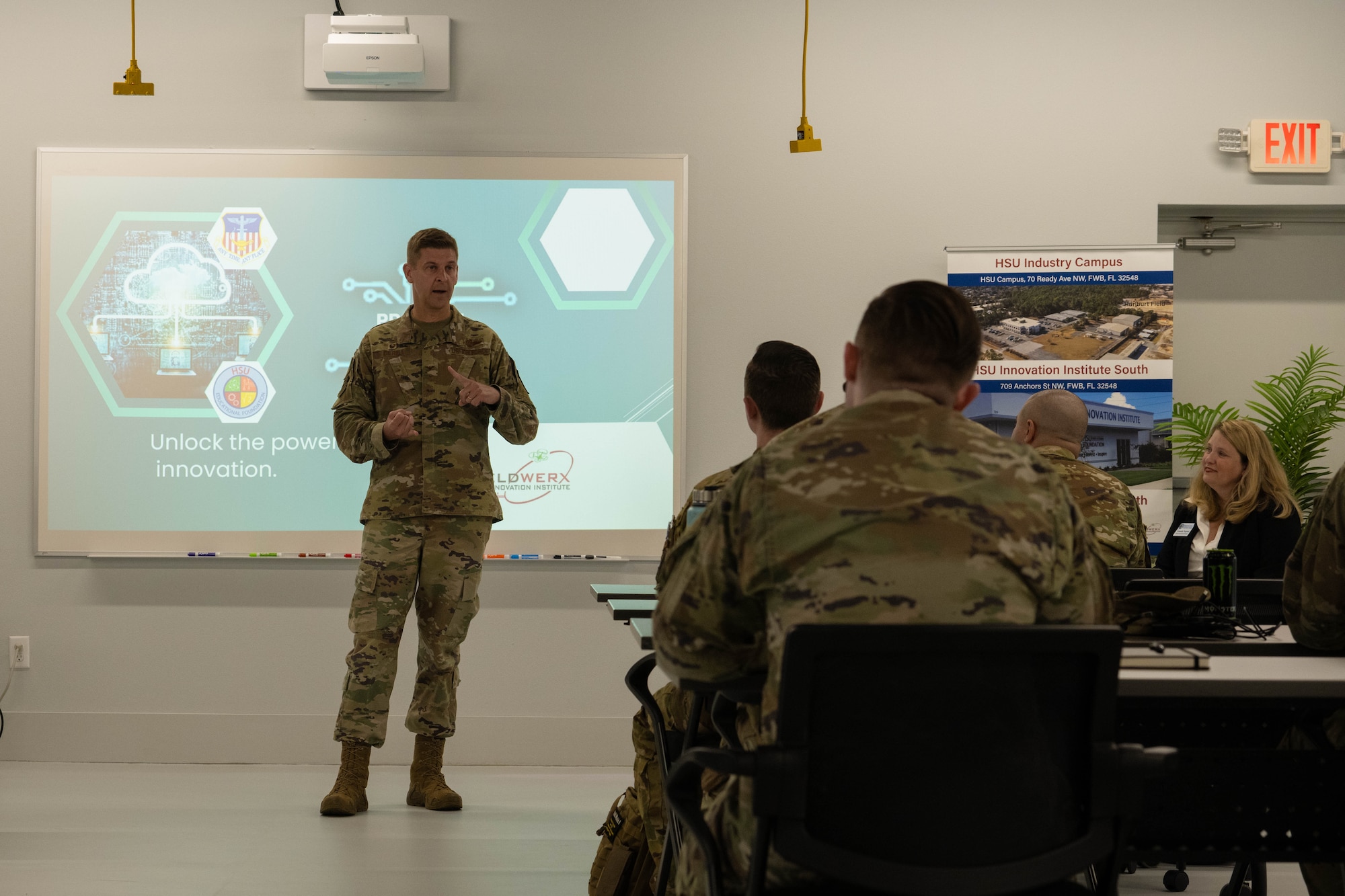 U.S. Air Force Col. Patrick Dierig, 1st Special Operations Wing commander, gives opening remarks during the Critical Analysis Training Accelerator: Learning to Yield Solutions through Technology course kickoff at a HSU Education Foundation building near Hurlburt Field, Florida, July 8, 2025