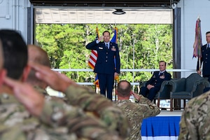 Members of the 711th Special Operations Squadron render a salute to U.S. Air Force Lt. Col. Jason Fox, incoming 711th Special Operations Squadron commander, at a change of command ceremony at Hurlburt Field, Florida, July 11, 2025. A longstanding military tradition, the ceremony marked the official transfer of command of the 711th SOS. (U.S. Air Force photo by Liz Easterling)