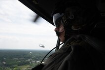 U.S. Marine Corps Josiah Lackey, a helicopter crew chief with Marine Light Attack Helicopter Squadron (HMLA) 773, 4th Marine Aircraft Wing, Marine Forces Reserve, assigned to Special Purpose Marine Air-Ground Task Force-250, carries out safety measures on a Bell UH-1Y Venom while in route to Romeoville High School for a community event during Marine Week Chicago, July 10, 2025. Romeoville High School hosted a community event to celebrate the Marine Corps' upcoming 250th birthday. Throughout 2025, Marines across the globe will celebrate the birthday of the Corps, commemorating service, sacrifice, and priding themselves on living ‘Semper Fidelis’ or ‘Always Faithful’ to their nation and to each other. (U.S. Marine Corps photo by Lance Cpl. Andra Marton-Salgado)